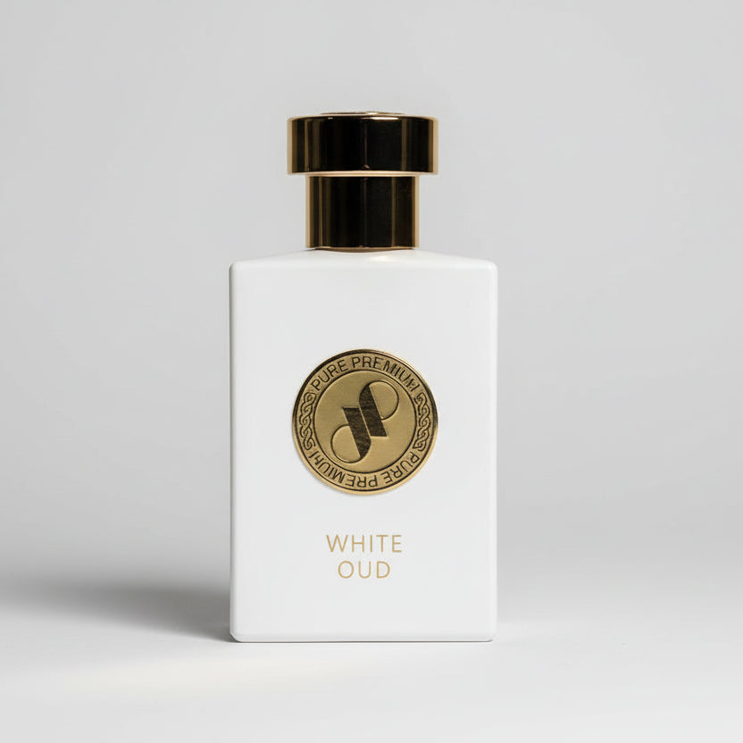 White Oud perfume bottle with gold cap on a white background